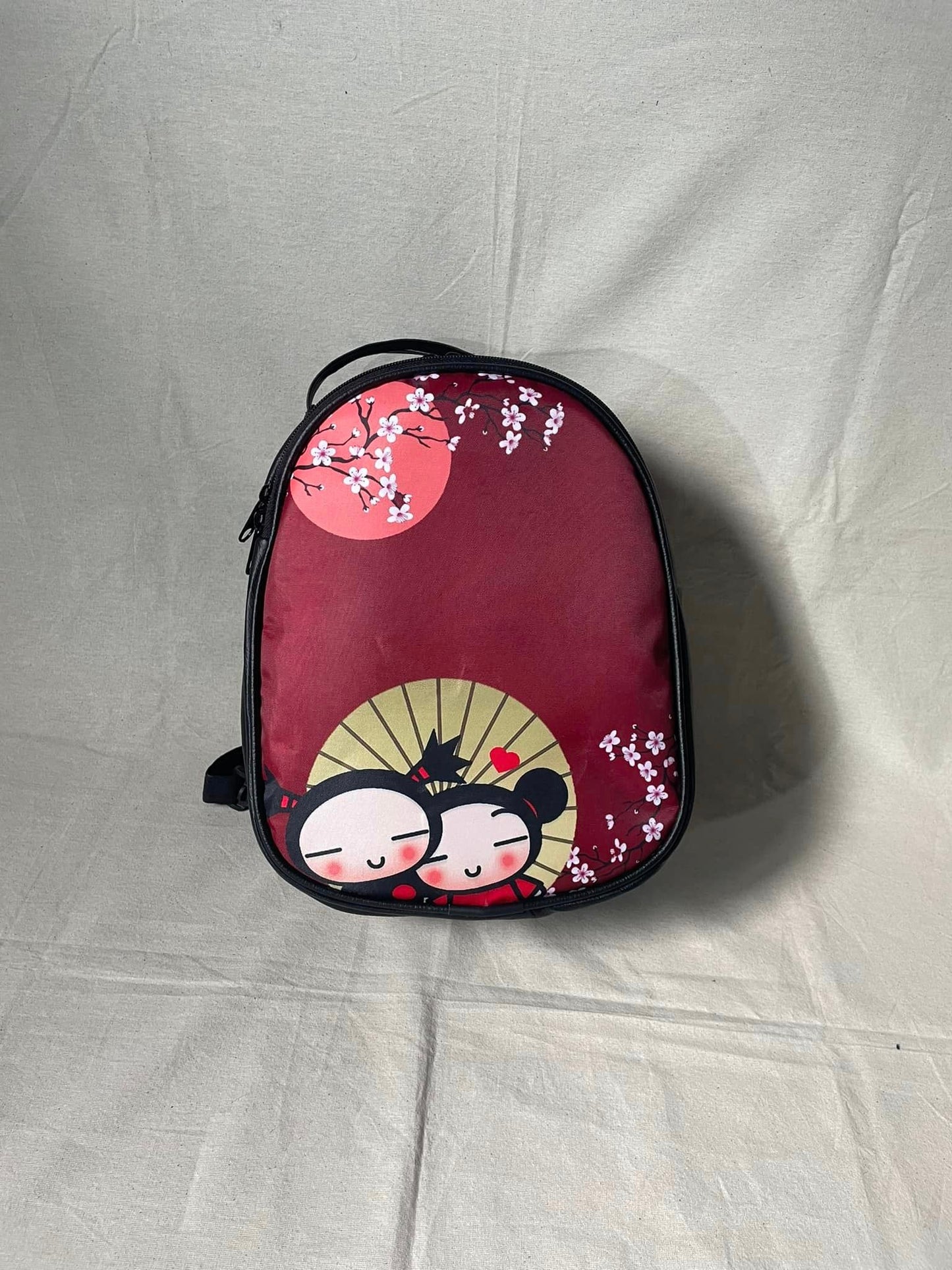 Mochila de Pucca - Amor y Locura ❤️ (Tamaño carta)